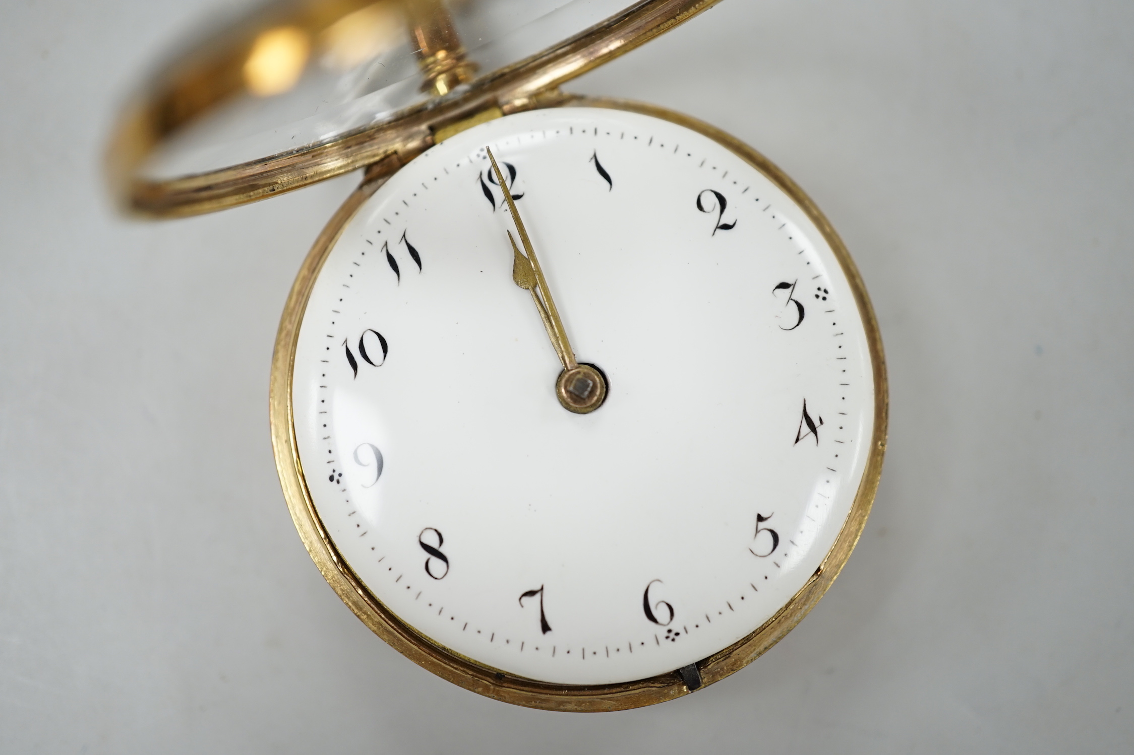 A 19th century gilt metal and polychrome enamel pair cased keywind verge pocket watch by Rigly, Roe & Newcomb of London, case diameter 52mm.